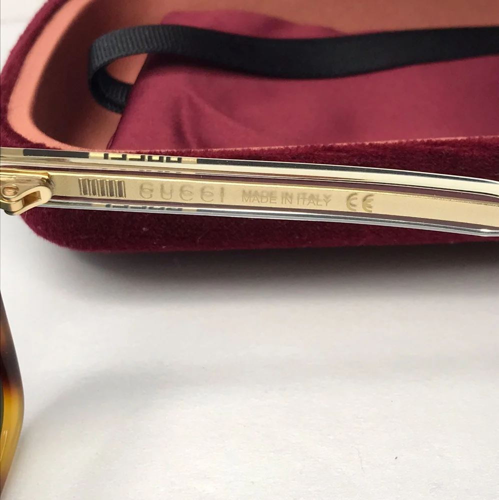 New - 💯 original Gucci Green Rectangular Men's Sunglasses GG0558S 003